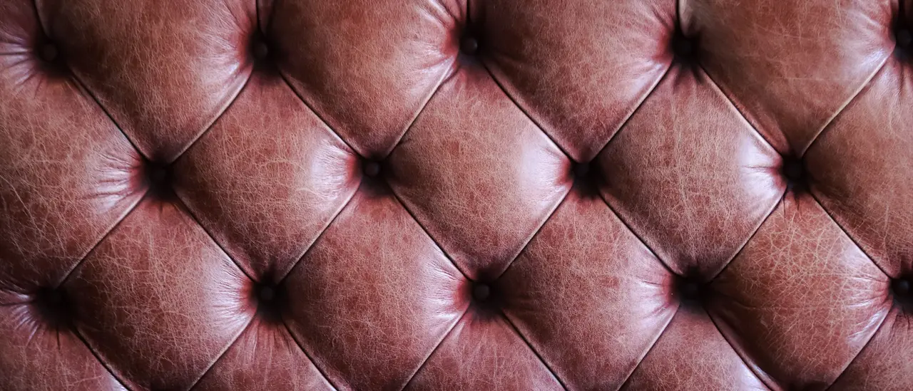 Close-up of tufted leather upholstery
